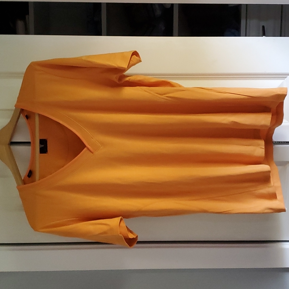 NWOT fitted tangerine V neck t-shirt. Short sleeves.